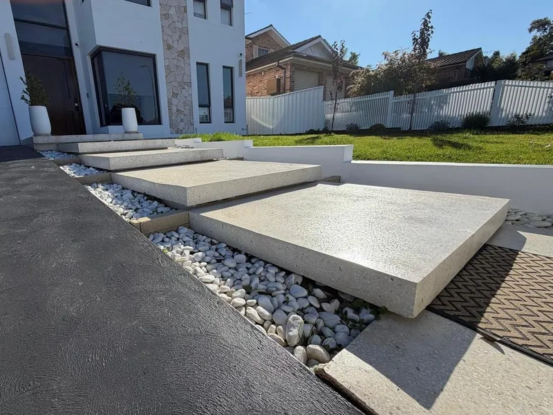 The finished floating steps leading up to the front door at Baulkham Hills