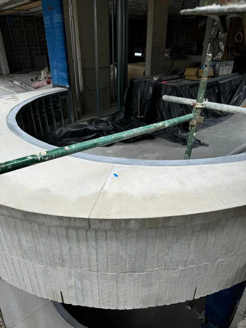 Close view of the polished concrete surface and control joint on a finished sill