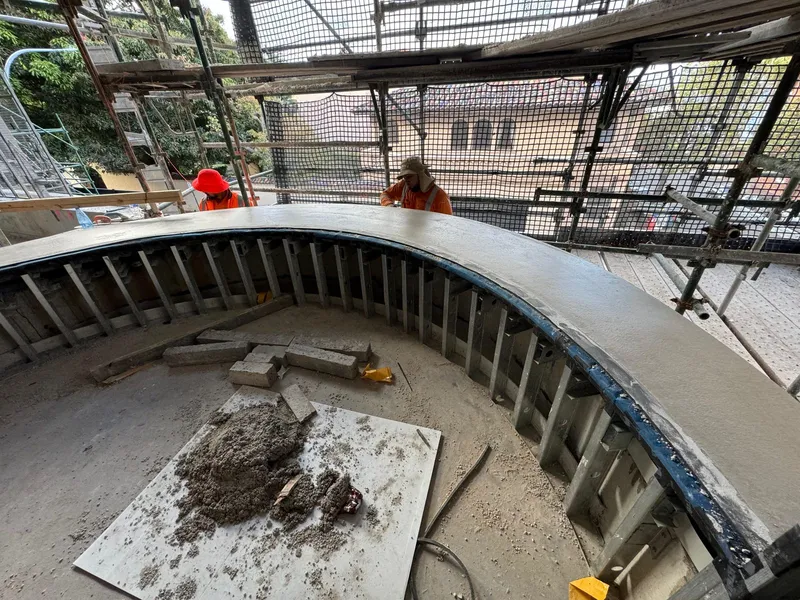 Formwork for one of the curved window sills still in place before stripping, Elizabeth Bay