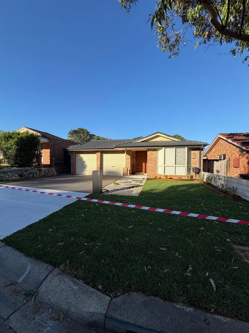 The finished driveway and new front yard landscaping at Holsworthy