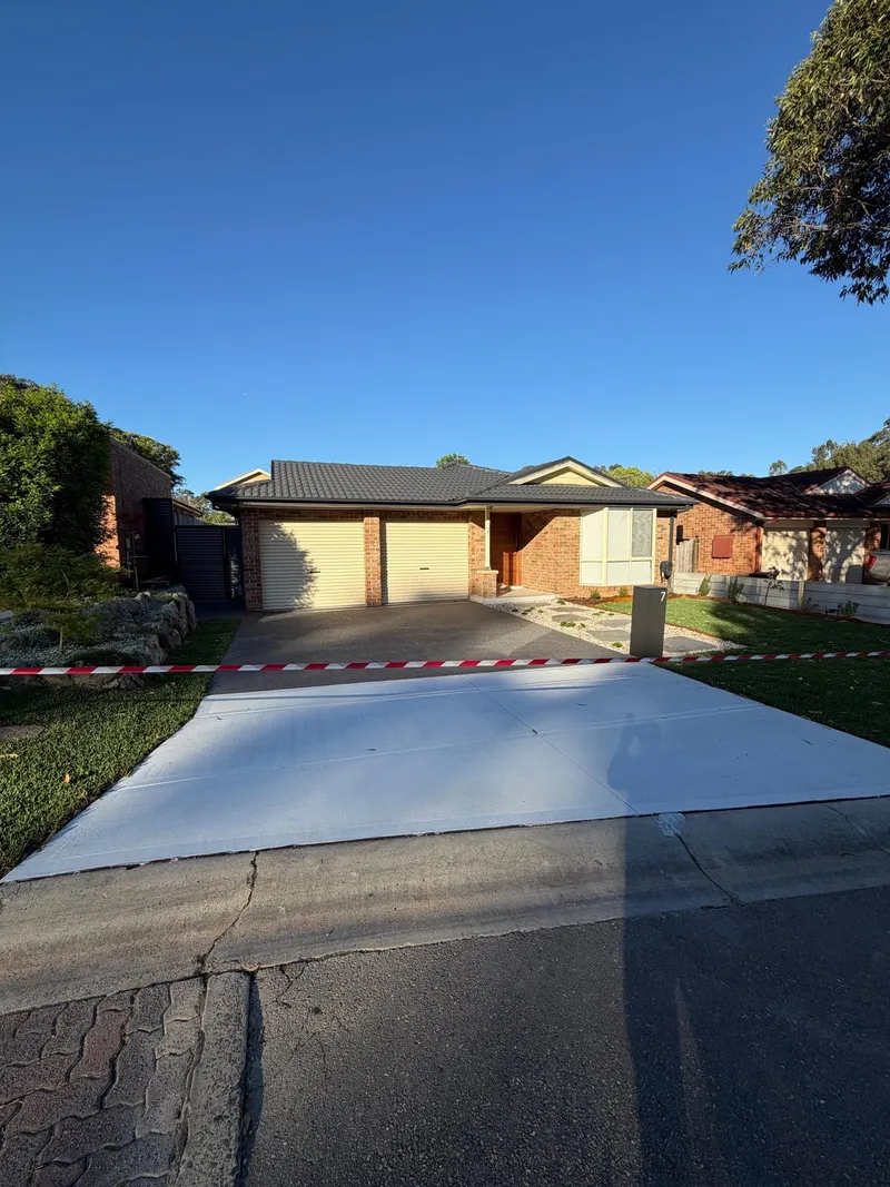 Street view of the finished driveway and front yard at Holsworthy