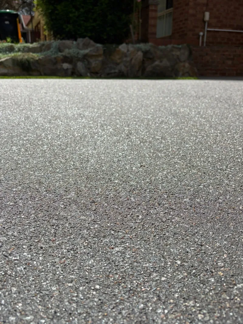 Close view of the finished 'Emperor' exposed aggregate texture on the driveway