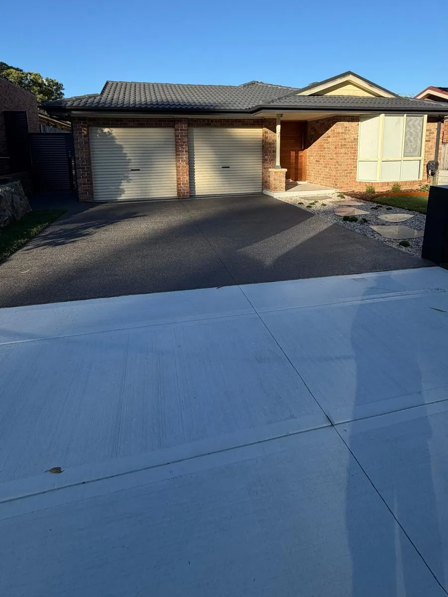 Finished driveway and new front yard landscaping, garage and letterbox at a home in Holsworthy, NSW
