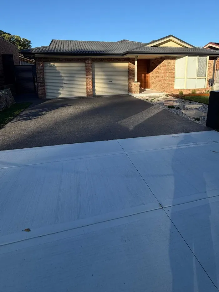 Finished driveway and new front yard landscaping, garage and letterbox at a home in Holsworthy, NSW