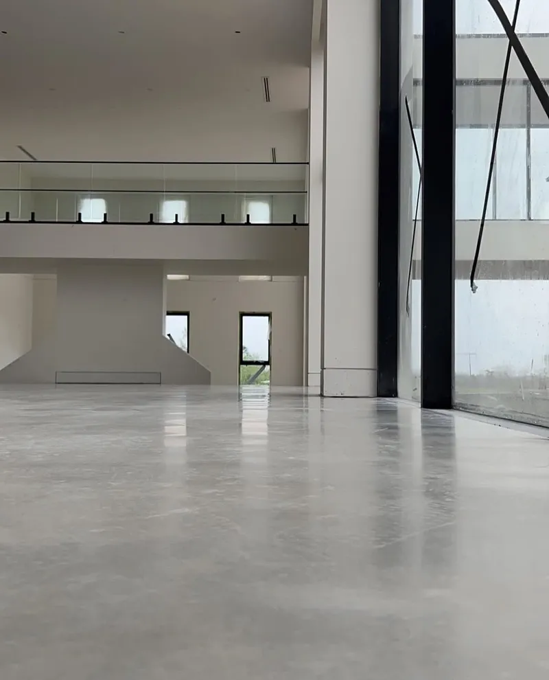 Burnished concrete floor under the upstairs balustrade, Horsley Park