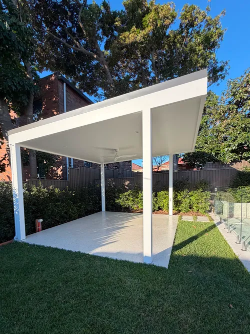 Concrete cabana slab finished together with turf laid on all sides, Matraville NSW