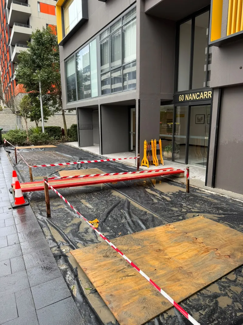 Formwork and plywood protection laid across the 60 Nancarrow Ave entrance before the pour
