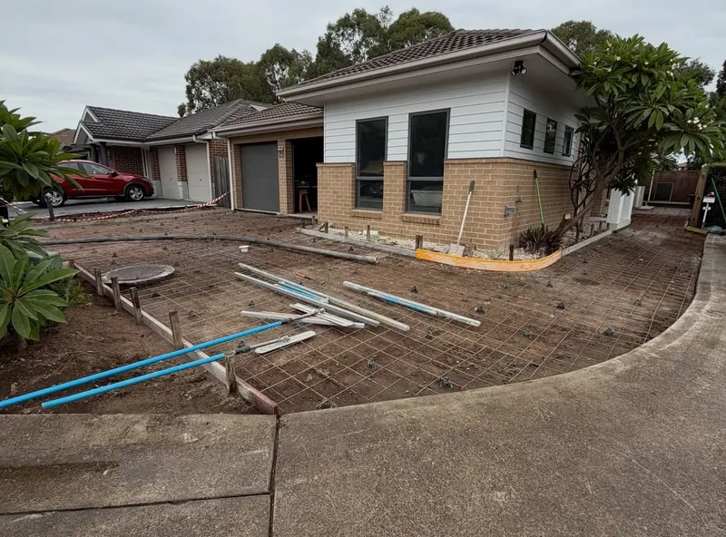 Formwork and reinforcement set out around the garage and side path at Oakhurst, before the pour
