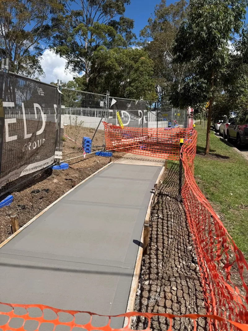 A freshly poured section of the reinforced concrete footpath at the reserve