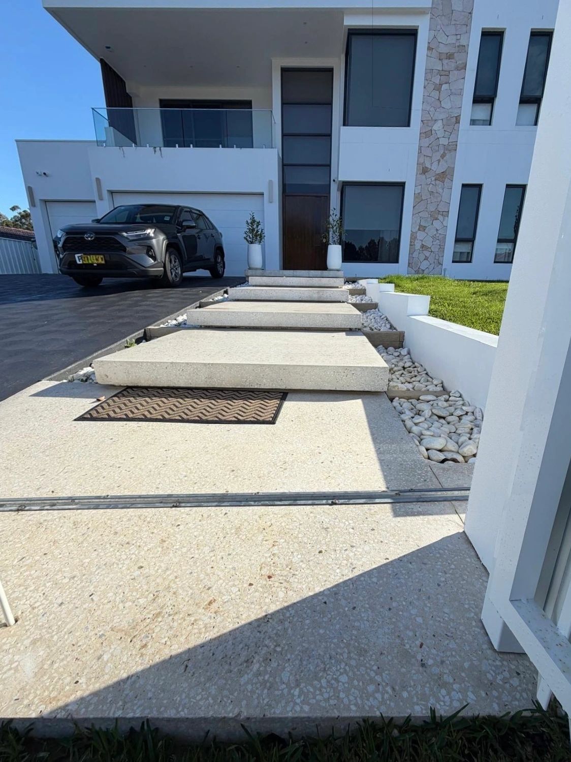 Geostone exposed aggregate floating steps in Baulkham Hills NSW